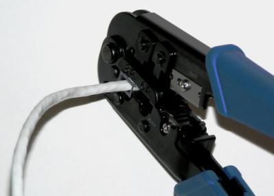 plug, as shown in Figure 3.2-7. Recheck the color sequence of the inserted wires; you may need to remove and re-insert them a few times to get all eight in with the correct color order.