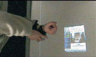 42 Human-Computer Interaction (a) (b) (c) Figure 4.3: (a) Xybernaut wrist-mounted display. (b) Fossil Wrist PDA watch. (c) Simulator of a watch-sized wrist projector [BFC05].