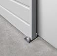 Colour: door leaf, track and rain canopy in grey-white (similar to RAL 9002). RAL to choice on request.