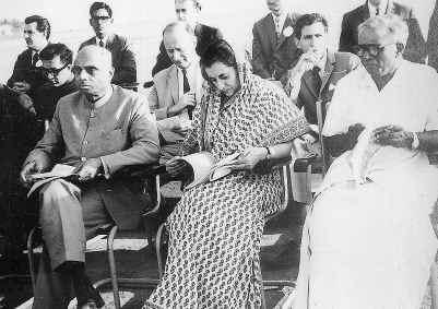 Figure 11. Arnold Frutkin seated behind Indira Gandhi Source- The Hindu either by declassification of Arcas or by provision of the classified Arcas under suitable waivers and guarantees.