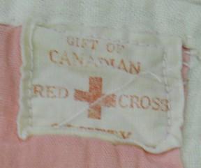 It was given to Pam Jones of Beckenham. Pam and her sister were both given a quilt when they were bombed out of their home. Quilt gift label on back of a quilt in the Quilter s Guild Collection. 1.