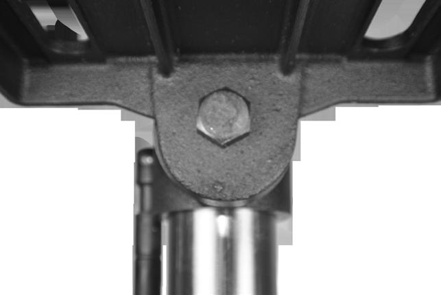 depth on the scale. Loosen the lower nut on the threaded shaft (FIG.