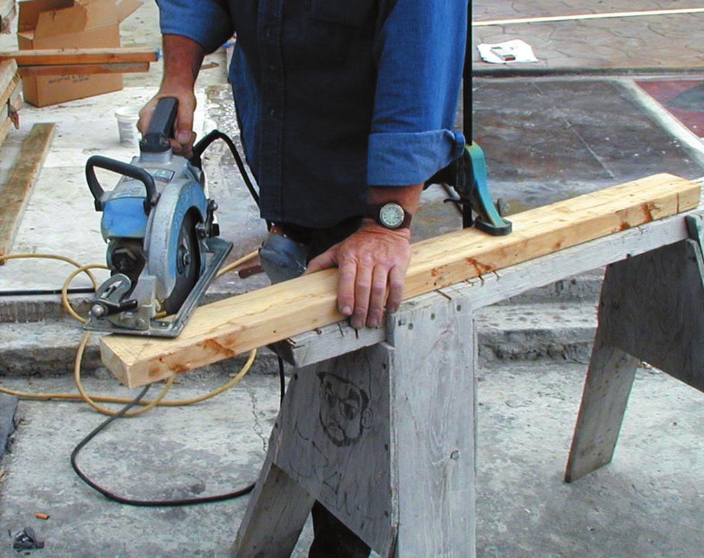 Yes No 3. Hold the 2 x 4 securely on the sawhorse and align the saw blade properly with the mark on the 2 x 4 (Figure 3). FIGURE 3 4. Check with your instructor for approval before starting the saw.
