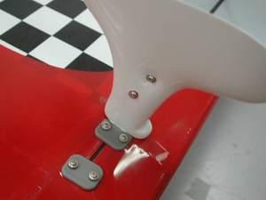 P43 Next, drill two 1/16 holes in the landing gear fairing to permanently mount the fairings to the