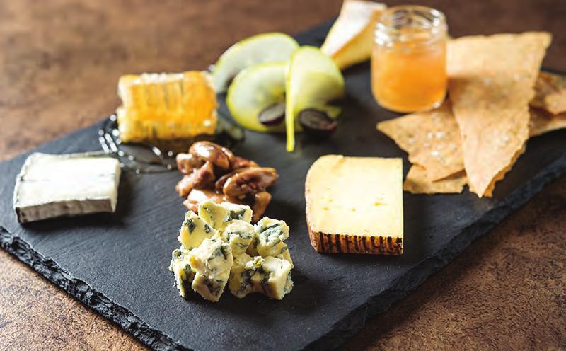 NIGHTBELL: At her more casual eatery (second from top), Button offers such bites as a regional cheese plate (top) with honeycomb, sorghum pecans, pickled apples and grapes, and herb crackers;