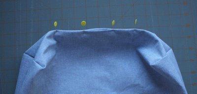 top stitch around the perimeter of the bag using a scant seam allowance. a walking foot is very helpful for this step.