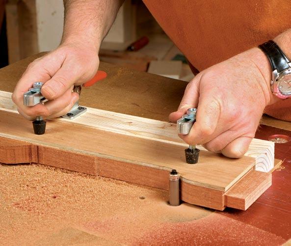 When you reach the point where the grain changes direction, reverse the workpiece in the jig. Trim face frames flush to case.