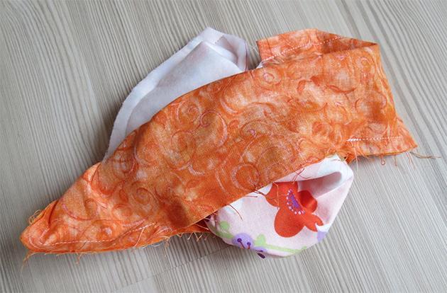 Using the opening left in the lining, turn the outer pouch and the lining