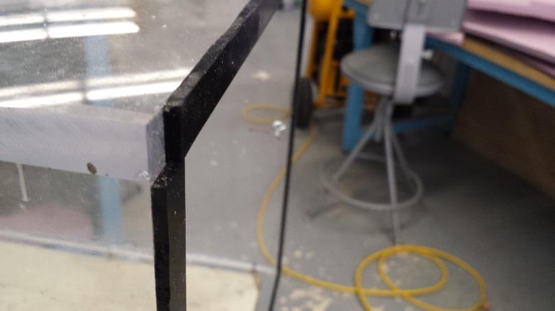 To then keep the test section airtight, the other edge was lined with a rubber gasket strip and clamped to the bottom