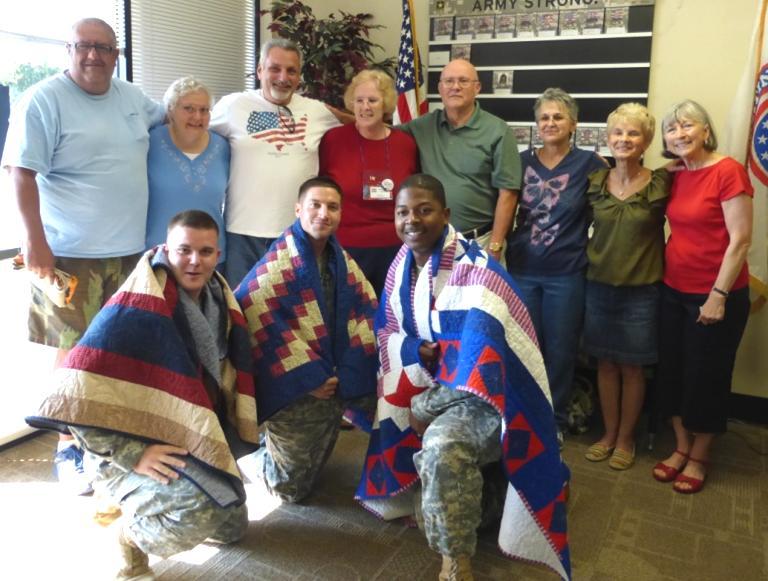 Quilts of Valor and QSC! The Quilters of South Carolina group has graciously adopted the Quilts of Valor organization mission and provided many, many quilts to SC Veterans who have served our Country.