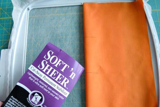 Sulky Soft n Sheer, a sheer but strong stabilizer, cutting mat s grid, making it is easy to keep fabric straight and
