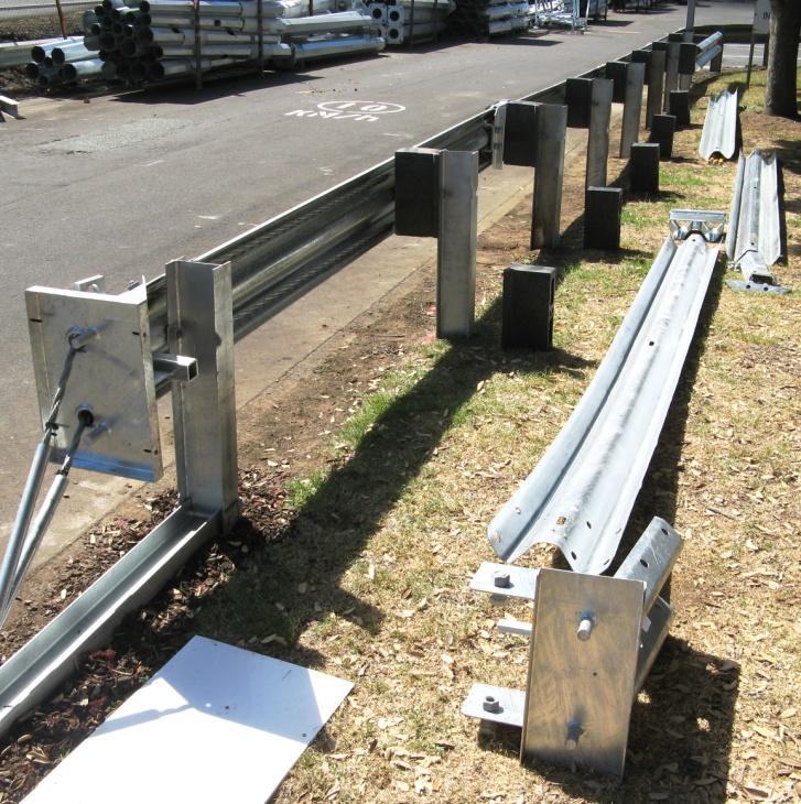 (Usually the side that has the heaviest volume of traffic). Pull a string line out the length of the system, parallel with the median barrier posts.