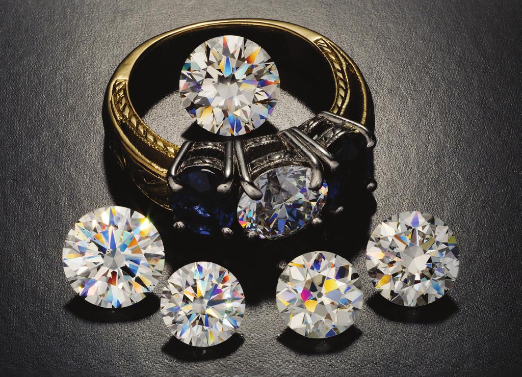 Feature Article Figure 1: Faceted diamonds such as these are graded according to the 4 Cs of cut, colour, clarity and carat weight The round brilliants shown here have clarity grades ranging from VS1