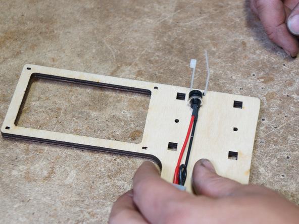 Step 14 Attach power adapter onto plate (wood part