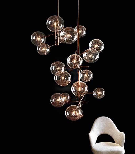 Bolle Massimo Castagna, 2014 Hanging lamp with halogen point light (120 Watt). Transparent blown glass balls. Metal parts in hand burnished brass.