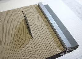 Remove the Sticky Strip liner from the bottom of the fence and adhere it onto the table top right next to the plywood.
