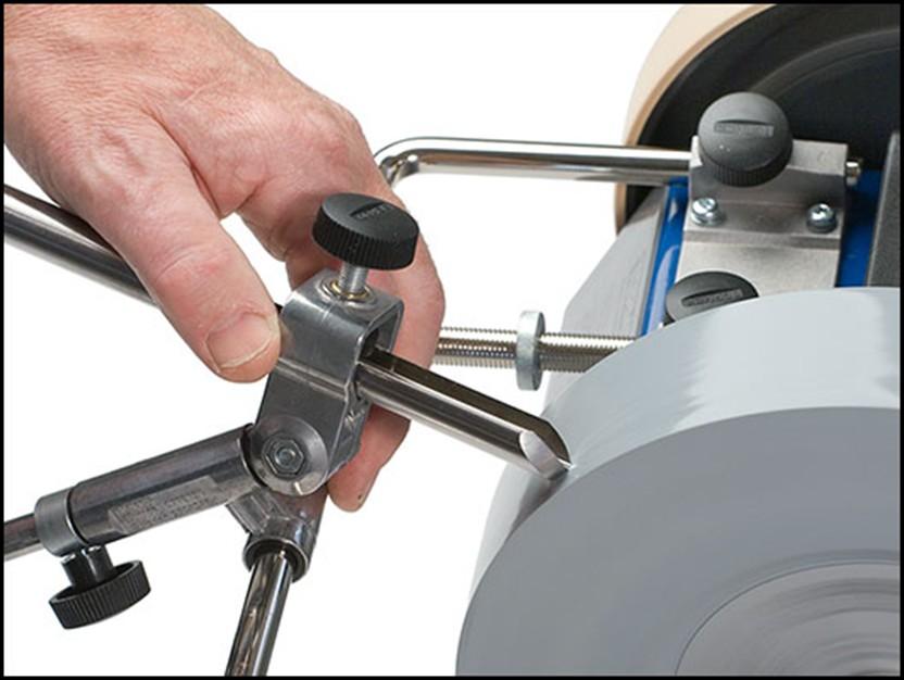 The Tormek wheel comes with a stone grader which allows the sharpening grit to change from 250 to 1000 grit by surfacing the wheel with fine slurry.