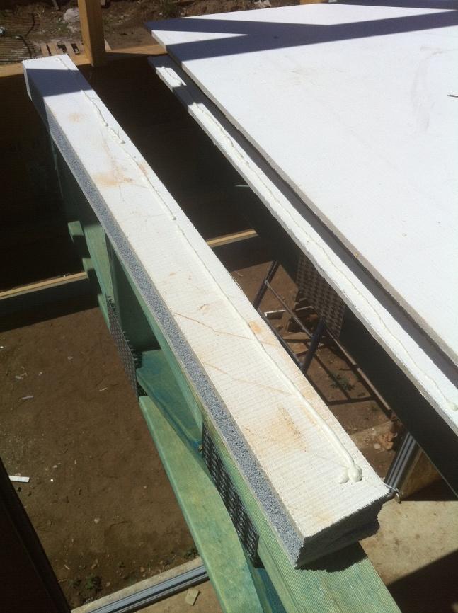 Once a bead has been applied to each joist, slowly lower the panel down into position. Secure the panel down with the large batten bugle screws. Next step is to install a box joiner.