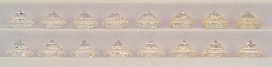 Figure 6: CZ master sets, colours E-L from manufacturer B (top row) and manufacturer A (bottom row). 6. To minimize confusion when comparing the unknown diamond's colour to the masters, these reference diamonds should be of similar wellmade cut and proportions.