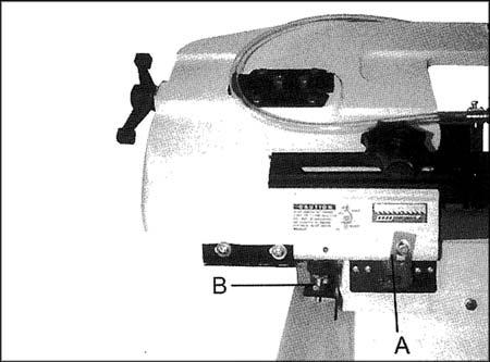 If the saw completes the cut and continues to run, adjust the trip bracket (A, Figure 22) down. 2. If the saw shuts off before the cut is complete, adjust the trip bracket (A, Figure 22) up. 3.