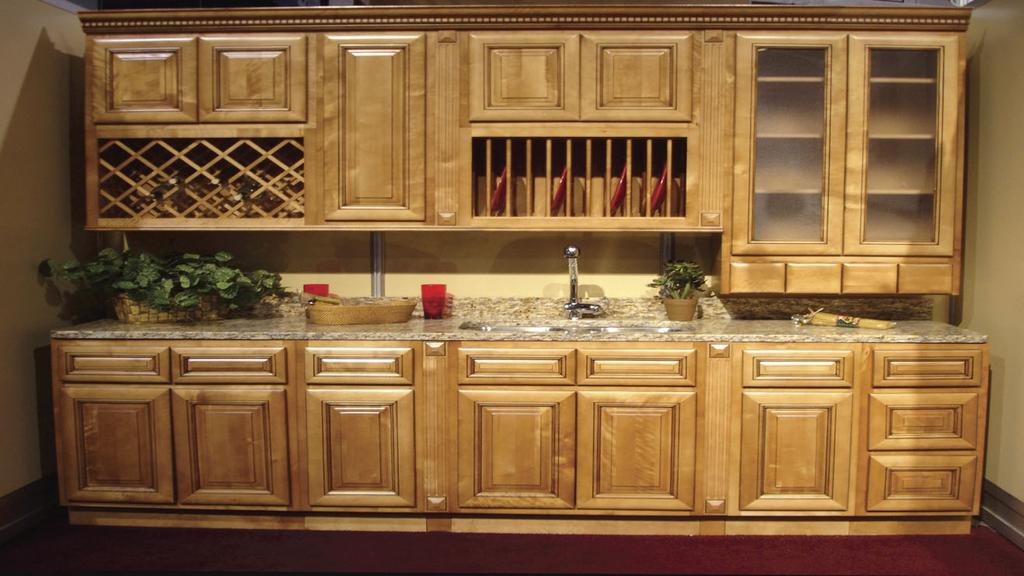 RTA Kitchen Cabinets Italian Collection Hickory Finish Kitchen Cabinetry FEATURES: * Italian Glass is frosted, not clear All wood glazed maple. 45 degree joint doors and drawers.
