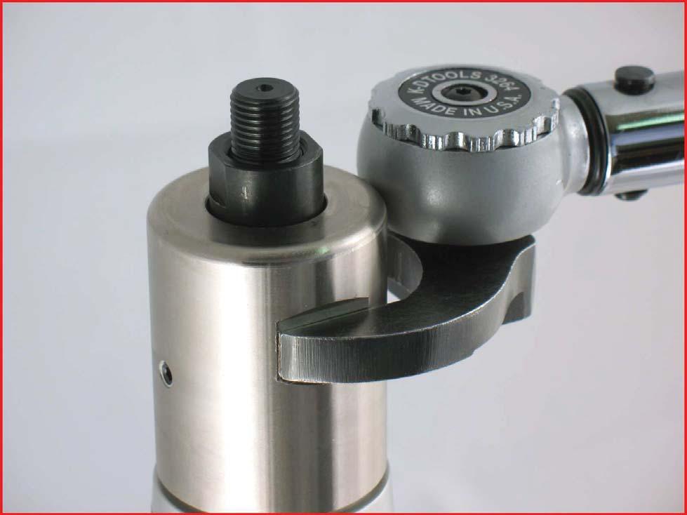 T to 35 N m/~300 in. lbs. Use a 1-9 / 16 " crowfoot and torque wrench to tighten the planetary gear casing or planetary cover. (T to 35 N m/~300 in. lbs.) 9.