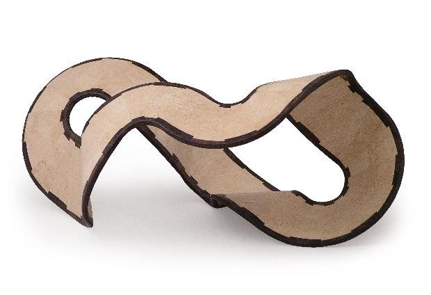 A twisted ribbon can also become a canvas for carving, piercing, painting, and pyrography.