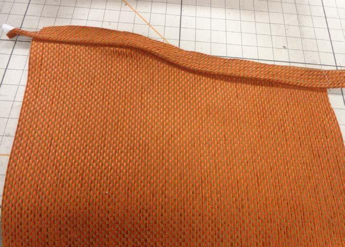 Make front folds / pleats and staple.