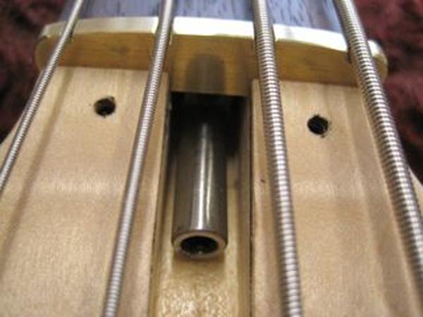 Truss Rod in Normal Position In this position the Truss Rod works in the same way that most typical truss rods do turning the nut clockwise will tighten the Truss Rod and decrease relief / bow in the