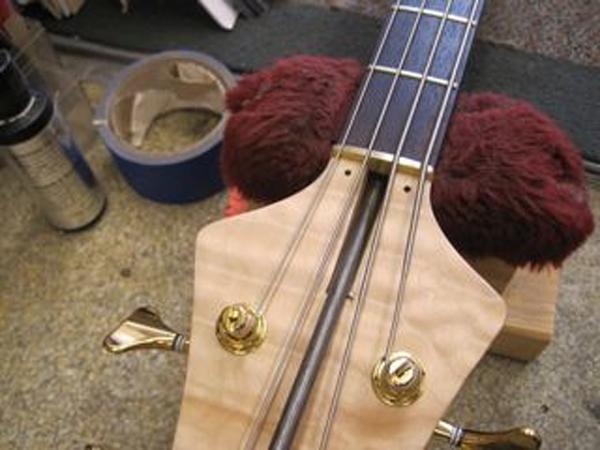 Now thread the Truss Rod Remover into the threaded
