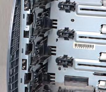 While the right latches contain the toner cartridge ground connections, the left ones simply secure and stabilize the cartridges.