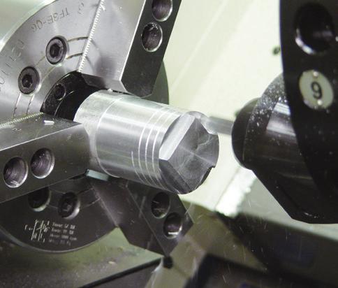 Separate servomotors are used for turret indexing and live tool operations. A disc-type hydraulic spindle brake provides positive locking during static machining operations.