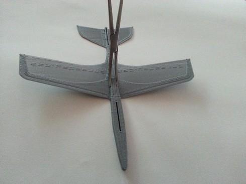 Use a spatula or similar tool to carefully lift the print from the print bed. The wings are easily damaged by bending during removal. A printable one may be included in your download.