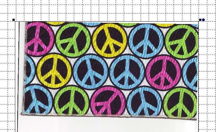 Supplies: Baby Lock sewing and embroidery machine QuiltWorks II from Designer s Gallery Scanner Purchased Hoodie ½ Yard of peace sign fabric 3 different colored fat quarters that coordinates with the