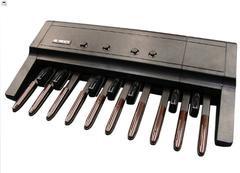 Unlike other similar portable keyboard setups that try to be an organ, the OAX-1 looks the part, it has been designed to be neat and compact.