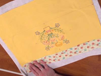 Lay a piece of medium-weight fusible interfacing with the fusible side facing up --