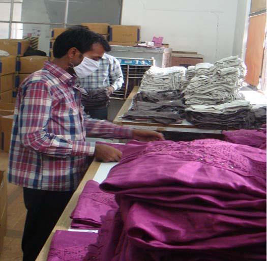 QUALITYCONTROL: Kimo clothing follows 4 point quality inspection of fabric.