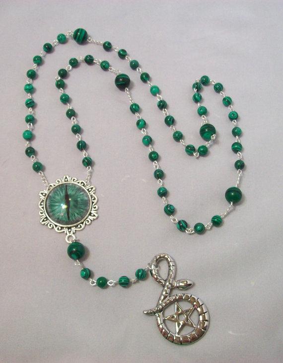 The Witch s Rosary, like the Catholic Rosary, uses the decade system: one large bead for every 10 small beads.