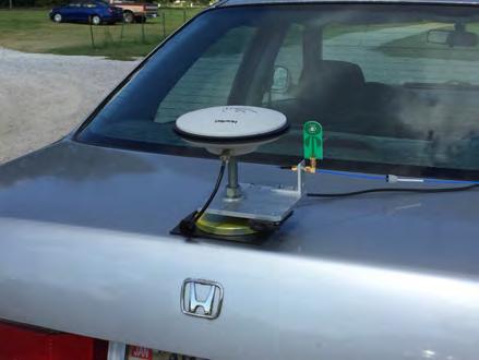 The lead sedan s Novatel Pinwheel GPS antenna was mounted on the back of the trunk close to the