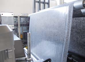 The slot supplies the exact amount of coating material to give the required coat weight and then transfers all of it to
