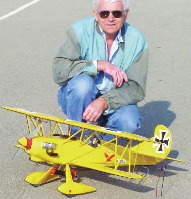 In addition to the three-views, I found some photos on the Internet of the original biplane.