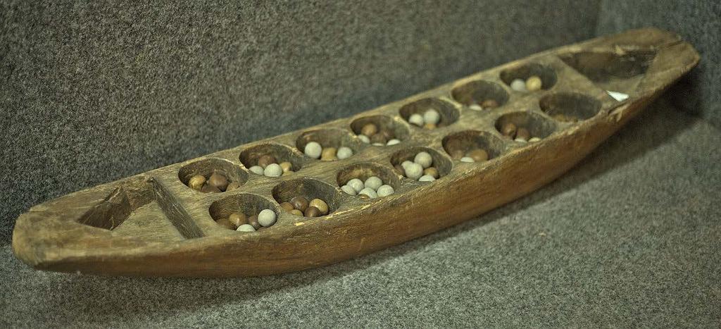 MANCALA Name comes from Arabic word naqala which means To Move Likely began in Ethiopia (Northeastern Africa) Developed between 500 and 700 AD May have initially represented farming