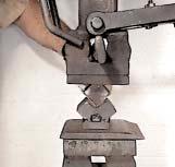 Make a sharp 90 bend at the mark in a V- block on treadle hammer.