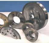 Gear grinding Discontinuous profile grinding gear basic Aluminium oxide grinding wheels from NORTON together with contour-controlled stationary dressing tools from WINTER.