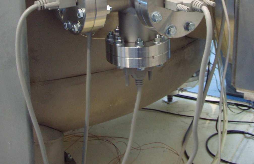 4 distributes the high current signals for the heating stages of the LaCoste and Roberts linkage. A picture of the intermediate board as installed on the ITM vibration isolator are shown in figure C.