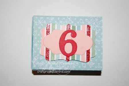 Instructions: Punch Real Red 2-5/8 x 1 using the Dotted Scallop Ribbon border punch and adhere to the center of the matchbox cover using SNAIL adhesive.