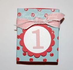 Day 1 Matchbox Day 1 Matchbox Materials: (1) Real Red box base, (1) Real Red polka-dot Candy Cane Specialty DSP matchbox cover, Real Red and Whisper White card stock scraps, (1) 9 length of Blushing