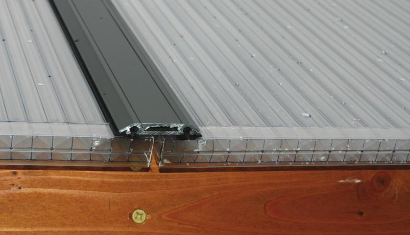 This can be done with a special breathable tape (B7524), aluminum channel, or by fitting the panel into a Polycarbonate End Cap.