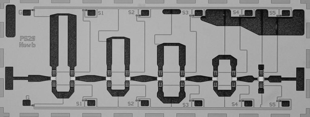 A Flexible Fabrication Process for RF MEMS Devices 267 Fig. 9. 5 bit phase shifter. Fig. 10. Switchable 1.8 5.2 GHz filter with capacitors and inductors on suspended dielectric membrane. 6.