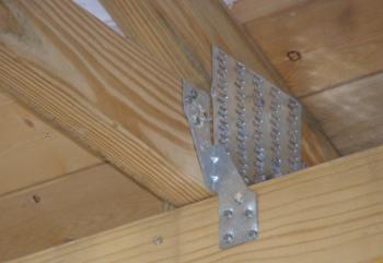 Ensure truss is square using a jig fashioned to your truss spacing.